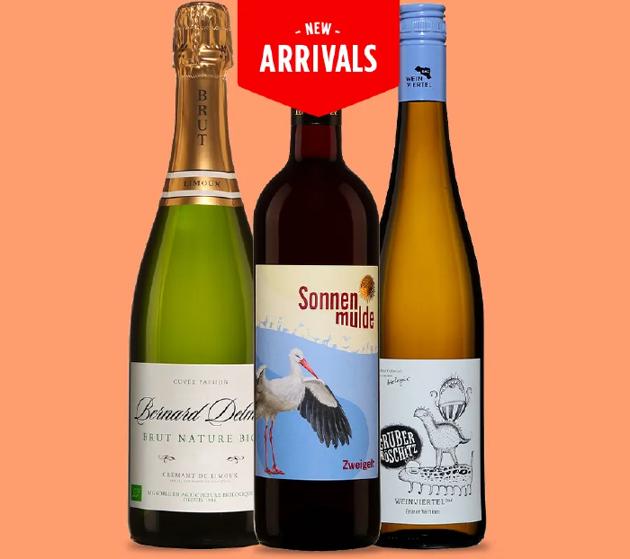 Web image of three bottles of wine, ours in the middle. A New Arrivals Badge on top.